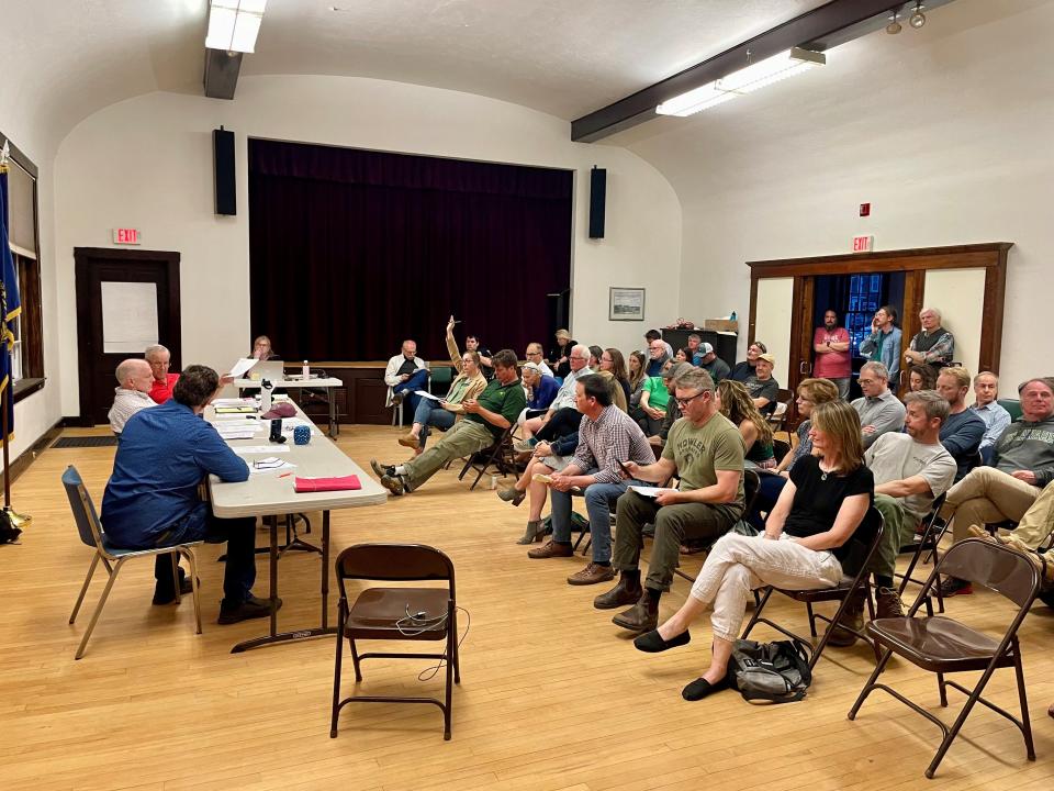 After some heated back and forth with residents, the Newfields Select Board committed Tuesday to sign a purchase and sale agreement for 101 acres of woodlands owned by the Rugg family and to suspend a Request for Qualifications many in town said was duplicative of work already being done for free by the Trust for Public Lands.