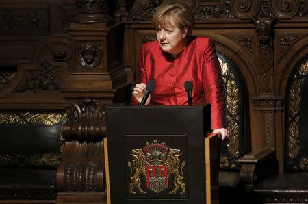 German Chancellor Angela Merkel holds a speech during the traditional historic banquet "Matthiae-Mahlzeit" (St. Matthew's Day Banquet) at the town hall in Hamburg February 12, 2016. REUTERS/Morris Mac Matzen