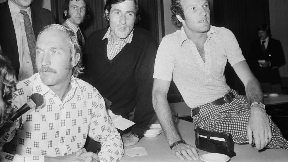 Stan Smith, Ilie Năstase and Tom Okker at a meeting of the Association of Tennis Professionals (ATP) in London, 20th June 1973. - Michael Webb/Keystone/Hulton Archive/Getty Images