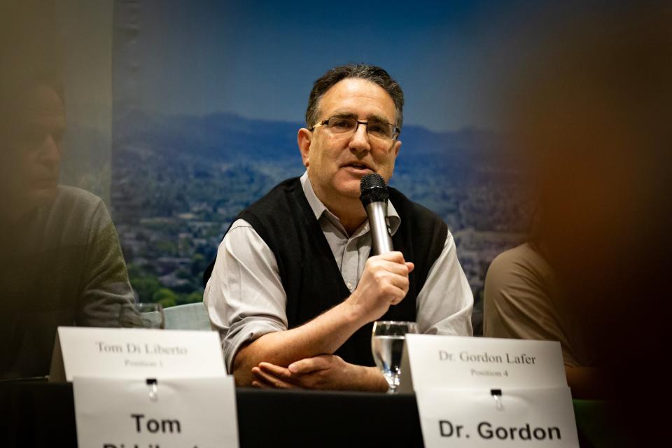 Gordon Lafer, a candidate for the Eugene School District 4J school board, speaks April 4 during a candidate forum.