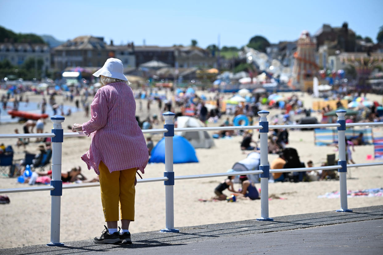 heatwave WEYMOUTH, ENGLAND - JUNE 29: Visitors enjoy the hot weather on the beach, on June 29, 2024 in Weymouth, United Kingdom. (Photo by Finnbarr Webster/Getty Images)