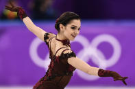 <p>Russia’s Evgenia Medvedeva competes in the women’s single skating free skating of the figure skating event during the Pyeongchang 2018 Winter Olympic Games at the Gangneung Ice Arena in Gangneung on February 23, 2018. / AFP PHOTO / ARIS MESSINIS </p>