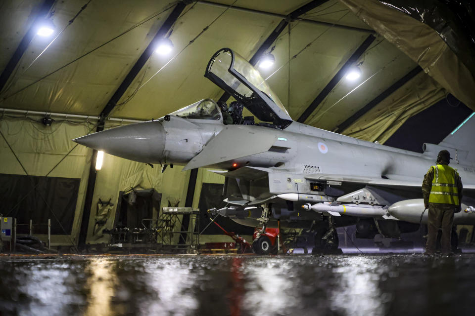 In this image provided by the UK Ministry of Defence, a Royal Air Force Typhoon FGR4 is prepared to take off to carry out air strikes against Houthi military targets in Yemen, from RAF Akrotiri, Cyprus, Monday, Jan. 22, 2024. The U.S. and British militaries bombed eight locations used by the Iranian-backed Houthis in Yemen on Monday night, the second time the two allies have conducted coordinated retaliatory strikes on an array of the rebels' missile-launching capabilities. (AS1 Leah Jones/Ministry of Defence via AP)