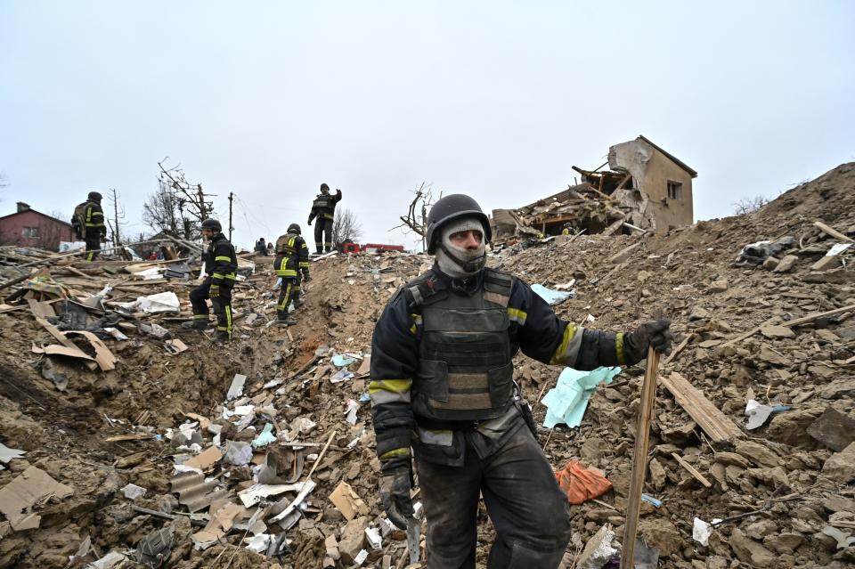 Rescue team works at a site of residential buildings destroyed by a Russian missile strike in Zaporizhzhia, Ukraine on March 22, 2024.