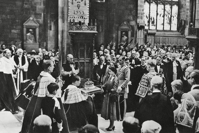 <p>Historia/Shutterstock</p> Queen Elizabeth attends the National Service of Thanksgiving at St Giles Cathedral on June 24, 1953.