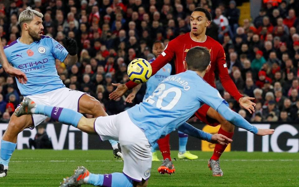 The ball hits Trent Alexander-Arnold on the arm but the referee, Micheal Oliver, did not point to the spot and VAR didn't come to the rescue of Manchester City  - REUTERS