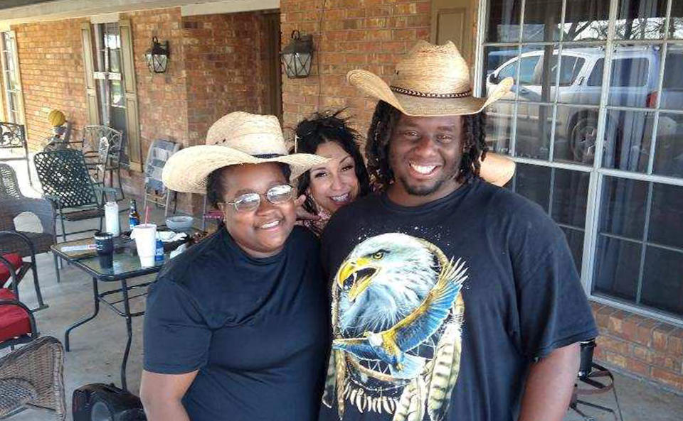 Kevin Jones (right) with wife Marissa (left) and Boudreaux's wife Erica (center). (Courtesy Jason Boudreaux)