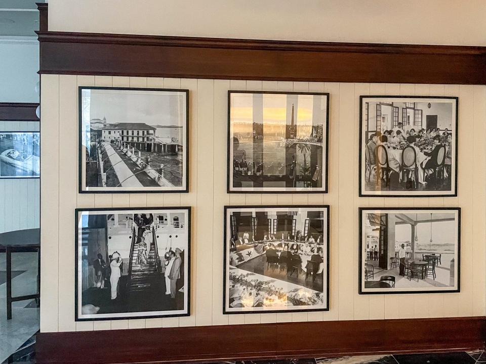 Rows of historic images lining the hotel's ballroom.