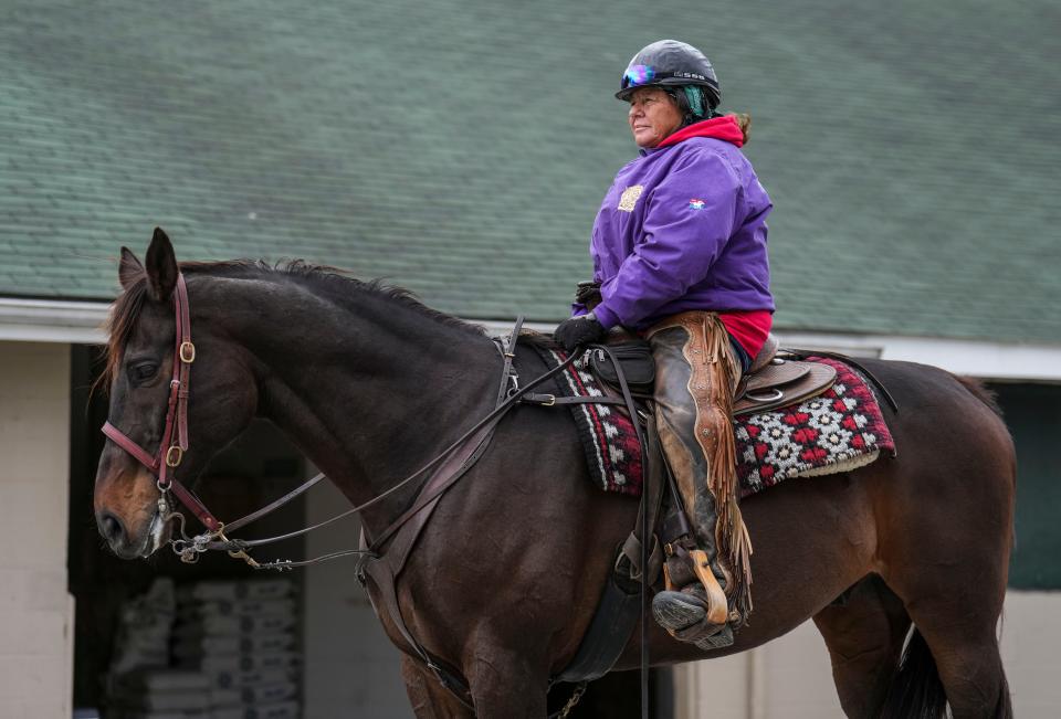  "We're not out there to play," horsewoman Monnie Goetz said. "It's a job. It's not a game. And I take my job very serious." Goetz was on the backside at Churchill Downs working Monday morning May 1, 2023, in Louisville, Ky. Goetz' job is to escort race horses during workouts and races.