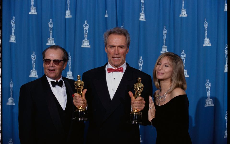 Eastwood flanked by Jack Nicholson and Barbra Streisand - Corbis via Getty