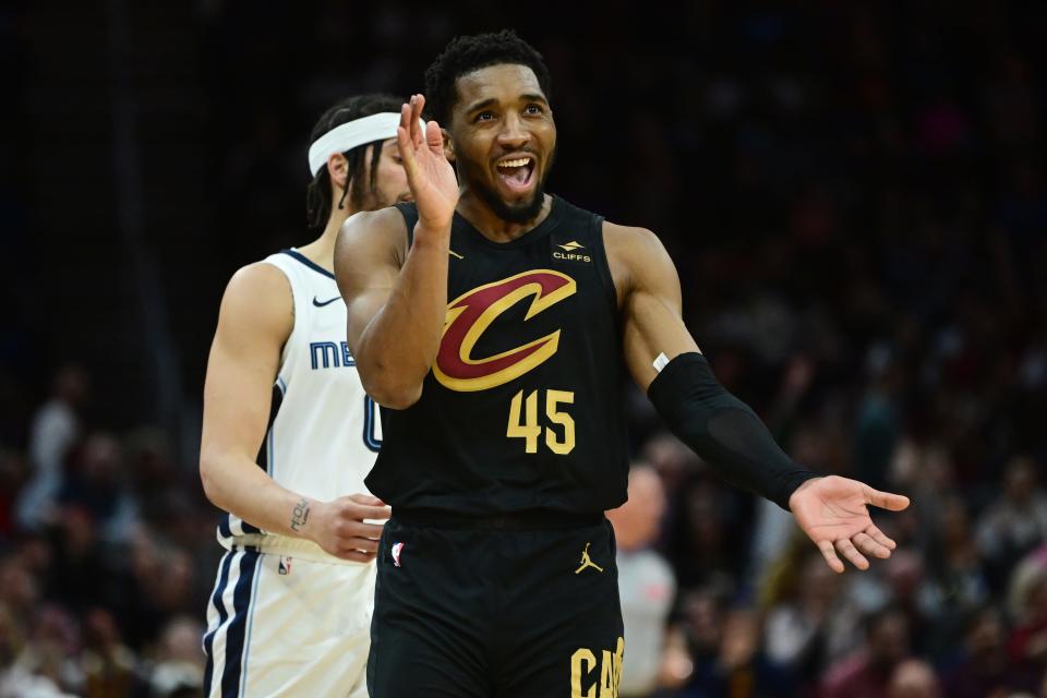 Cleveland Cavaliers guard Donovan Mitchell (45) celebrates after hitting a 3-pointer against the Memphis Grizzlies on Wednesday in Cleveland.