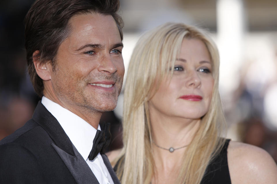 Actor Rob Lowe, left, and his wife Sheryl Lowe arrive for the screening of The Tree of Life at the 64th international film festival, in Cannes, southern France, Monday, May 16, 2011. (AP Photo/Joel Ryan)