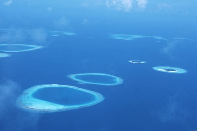 The Maldives consist of 1,190 small coral islands grouped