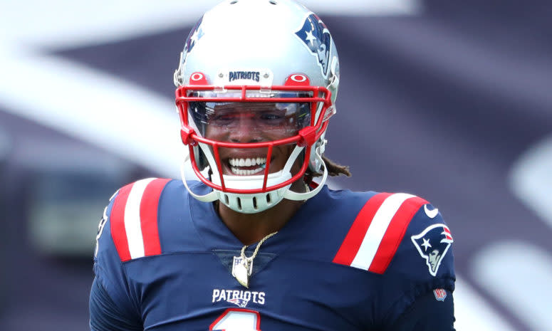 New England Patriots quarterback Cam Newton smiles.