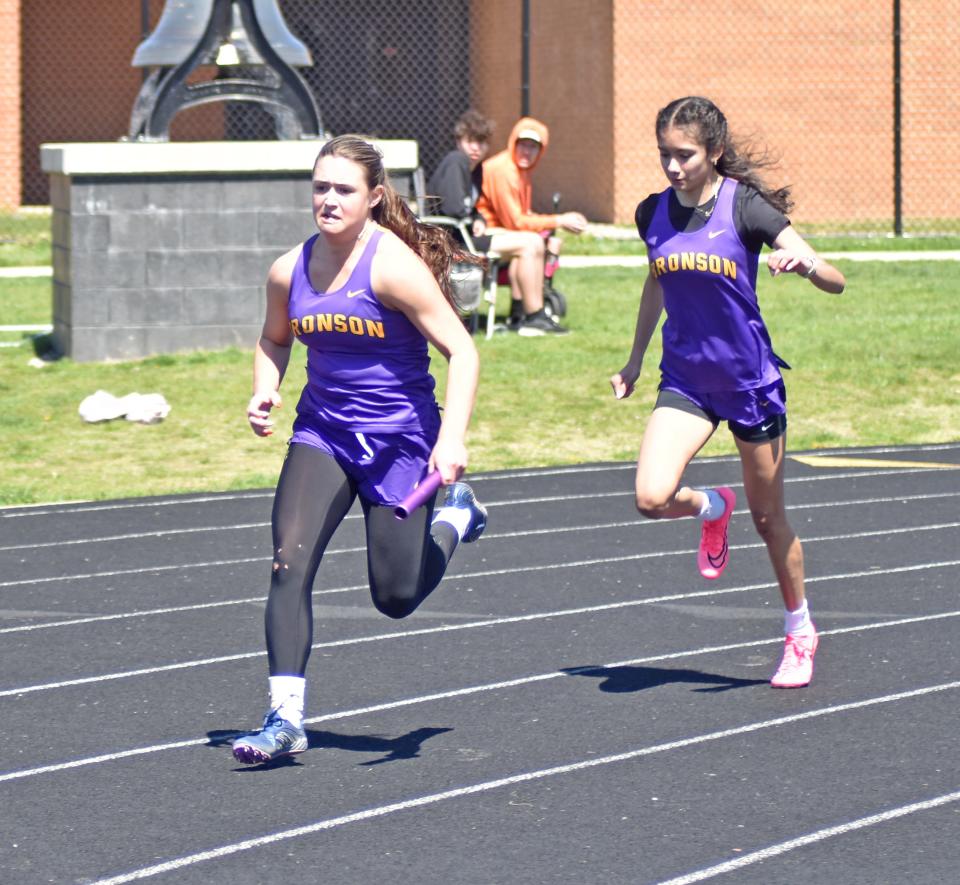 Bronson's Jaiden Hayes takes the final hand off during the 400 meter relay early this season. Hayes was voted as this week's Breathe Free Duct Cleaning Athlete of the Week