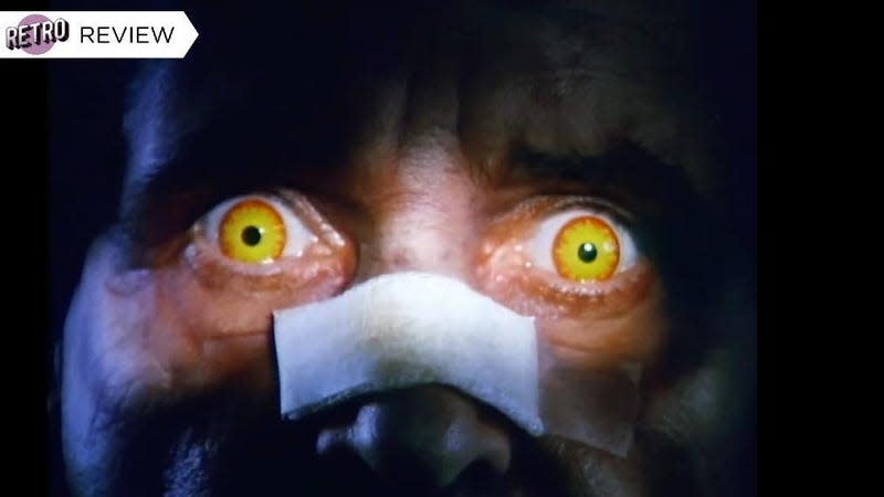 Demonic eyes of Father Karras in The Exorcist III