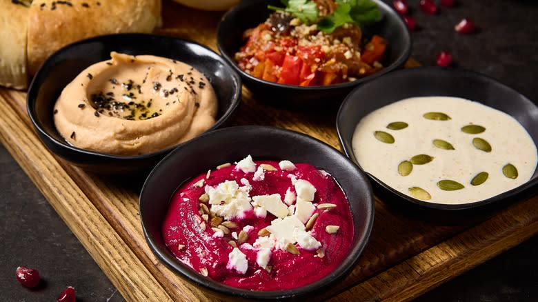 Bowls of hummus and dips