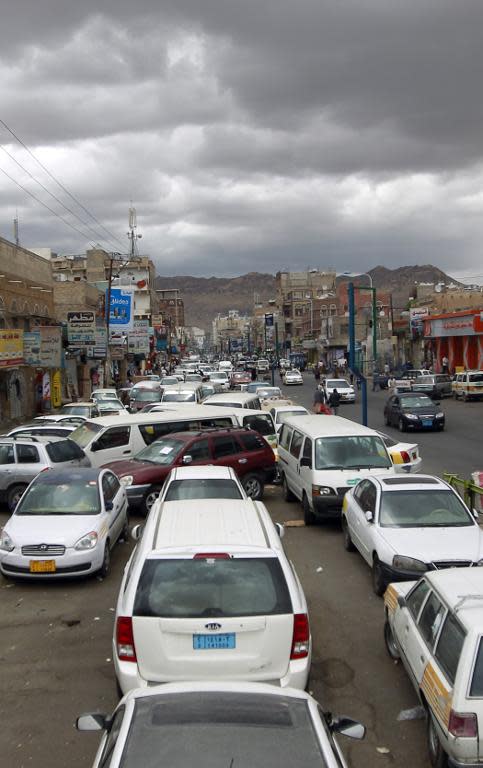 Yemen drivers queue to refuel their vehicles amid an acute shortage of fuel in the capital Sanaa, on May 4, 2015
