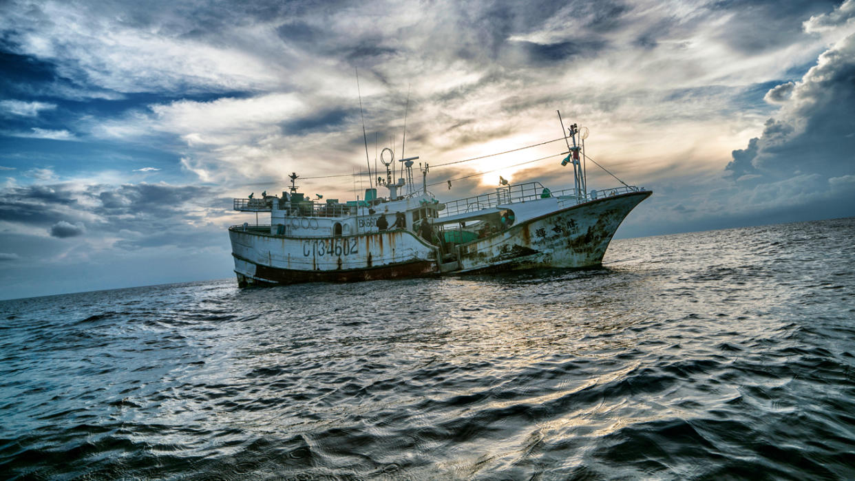 Members of the Palau Marine Police unit, tasked with patrolling a stretch of sea as large as France, search a foreign fishing boat operating in Palau territorial waters in 2015.