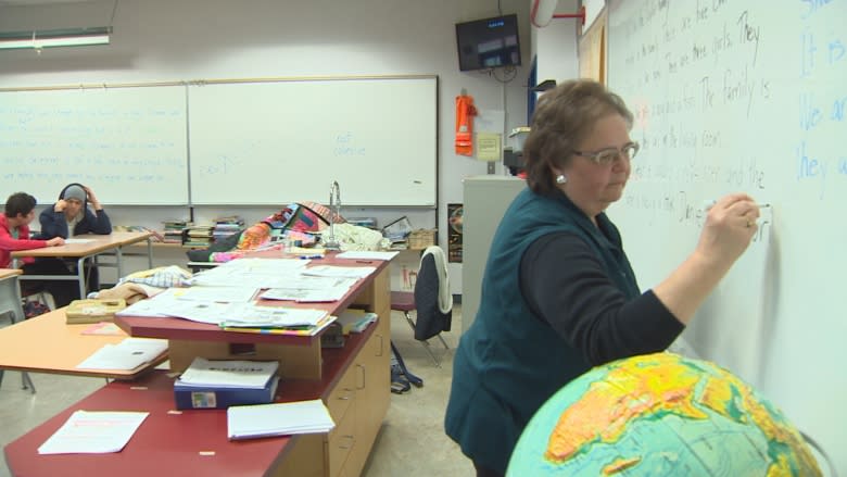 Retired B.C. teacher back in classroom helping refugee teens