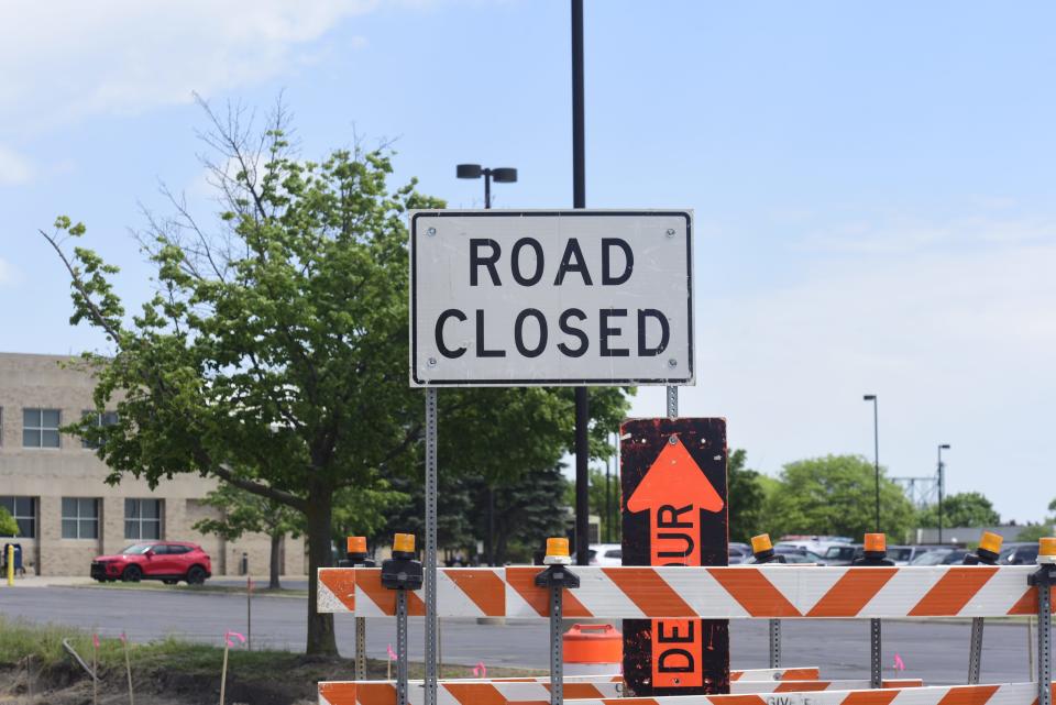 Road closed sign as construction continues on Fort St., in downtown Port Huron on Friday, June 3, 2022. The city is expected to finish the first phase of reconstruction on Fort St., by July. Work will be paused during boat week.