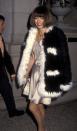 <p>Back in the ’90s, the Vogue editrix opted for a short, silky lingerie-inspired dress with an oversize fur coat (her version of grunge perhaps?). She’s worn a long gown to the gala ever since. (Photo: Getty Images) </p>