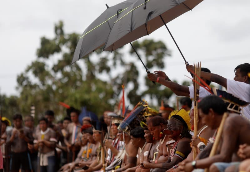 Indigenous leader Cacique Raoni of Kayapo tribe sits with other leaders during a four-day pow wow near Sao Jose do Xingu