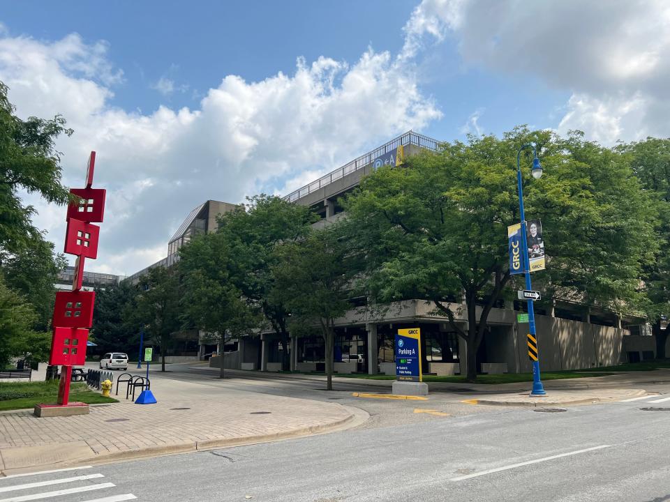 Trees line an entrance to Grand Rapids Community College's campus on Thursday, July 20, 2023, in downtown Grand Rapids, Mich. Legislators have included a one-time allocation of $70 million to expand a tuition-free community college program to Michigan adults.