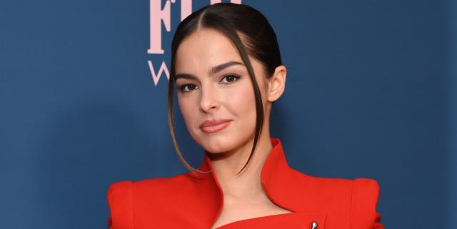 Addison Rae looks stylish in bright red tights to match her black and red  t-shirt