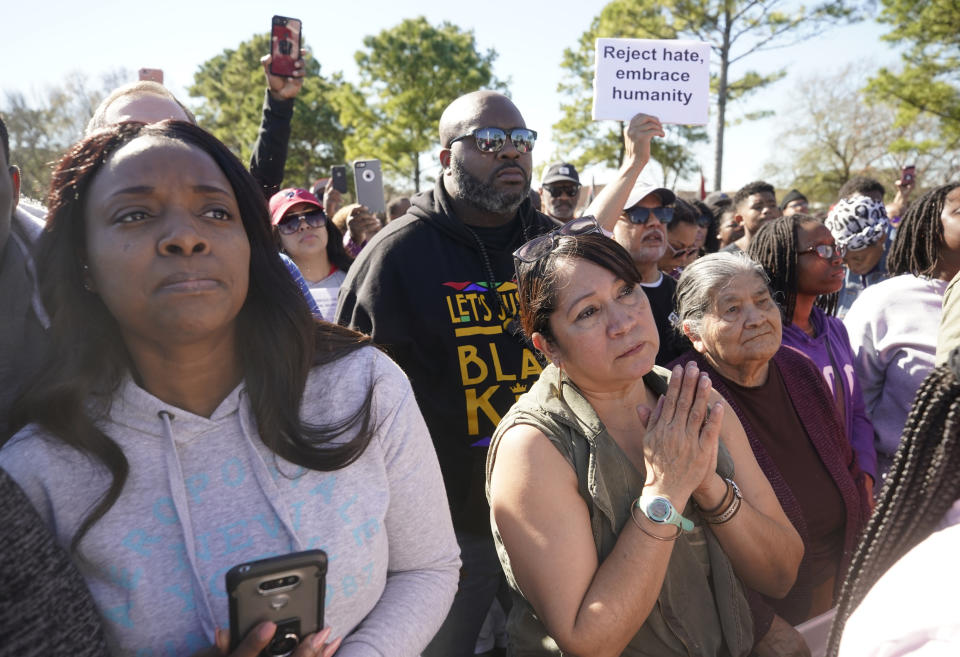 People attend a community rally for seven-year-old Jazmine Barnes on Saturday, Jan. 5, 2019 in Houston. Barnes was killed when a driver shot into the car she and her family were driving in last Sunday. (Melissa Phillip/Houston Chronicle via AP)