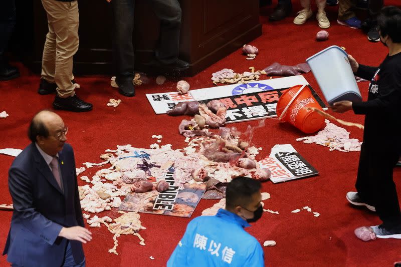 Pork intestines are seen during a scuffle in the parliament in Taipei