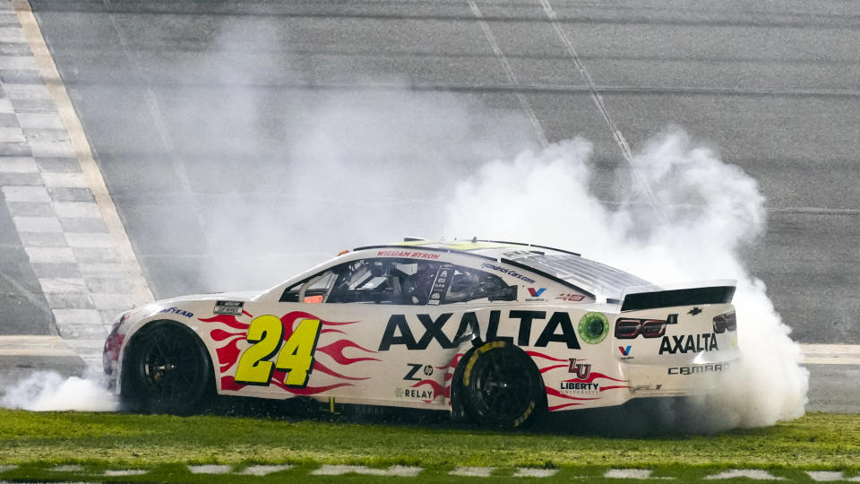 William Byron does a burnout at the finish line after winning the NASCAR Daytona 500 auto race at Daytona International Speedway, Monday, Feb. 19, 2024, in Daytona Beach, Fla. (AP Photo/John Raoux)