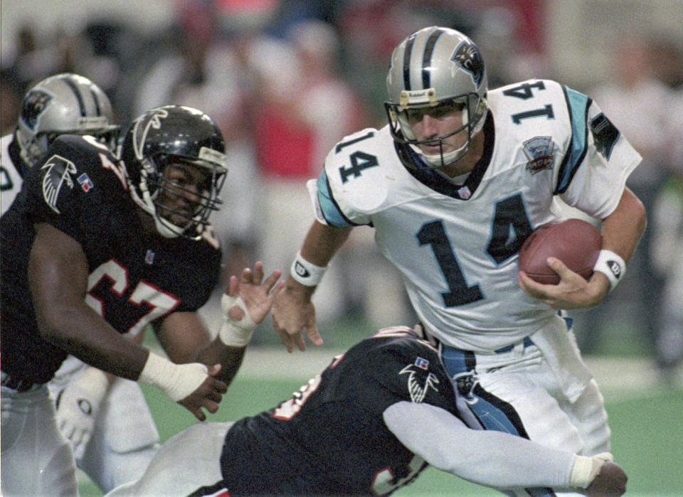 Carolina Panthers quarterback Frank Reich (14) plays against the Atlanta Falcons in Atlanta, Sept. 3, 1995. The Carolina Panthers announced Thursday, Jan. 26, 2023, they have agreed to terms with Frank Reich to become their new head coach. (Bob Leverone/The Charlotte Observer via AP)