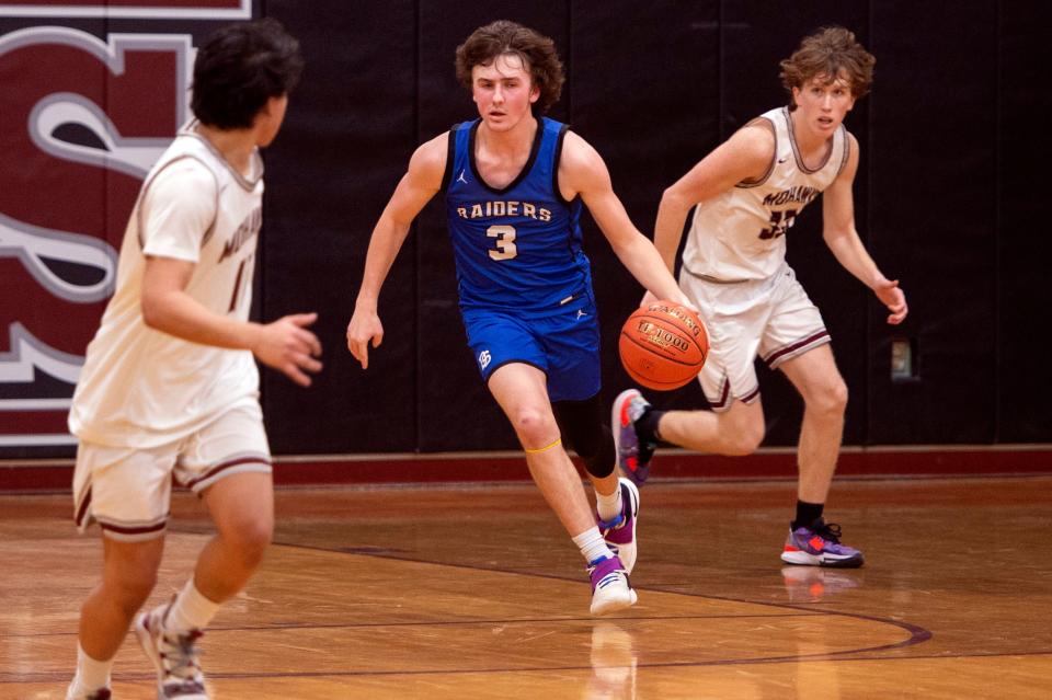 Dover-Sherborn junior Mason Melchionda hustles the ball up the court during the game in Millis, Jan. 31, 2023. The Raiders defeated the Mohawks, 75-60.