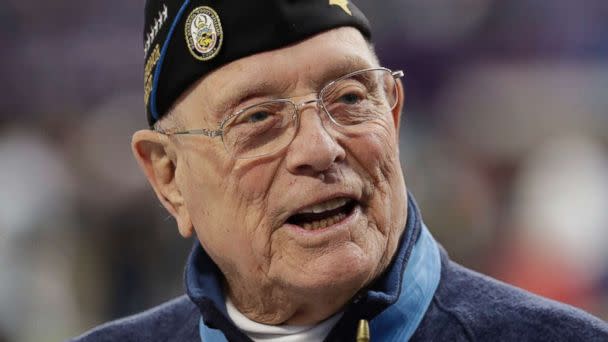 PHOTO: Woody Williams, 94, the only living Marine Medal of Honor recipient from World War II, assists with the coin toss of the NFL Super Bowl 52 football game between the Philadelphia Eagles and the New England Patriots, Feb. 4, 2018, in Minneapolis.  (Tony Gutierrez/AP)