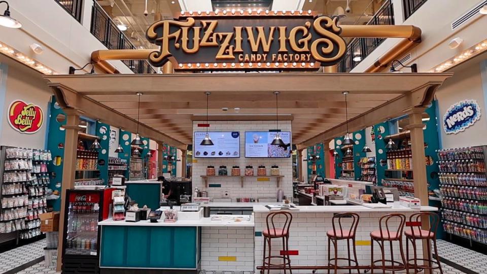 The Fuzziwig’s Candy Factory inside Wichita’s Scheels is two-stories and makes the whole store smell like fudge and sugar-roasted nuts. Travis Heying/The Wichita Eagle