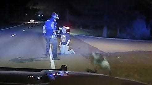 Dashboard camera footage released by the Town of York shows York Police Department Patrolman Jonathan Rogers using a K-9 to subdue pediatrician Stephen Brennan during a traffic stop on Sept. 20, 2019. The footage was released publicly Jan. 12, 2022, in response to a public records request. The video shows Brennan was on his knees before the K-9 made contact with him.