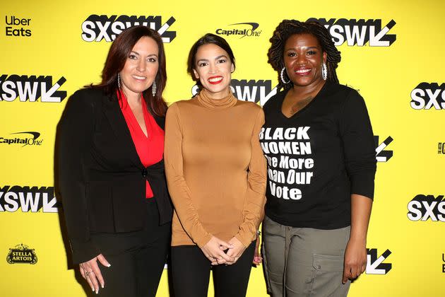 Cori Bush, right, joins Amy Vilela, left, and Rep. Alexandria Ocasio-Cortez (D-N.Y.) at the premiere of the documentary 