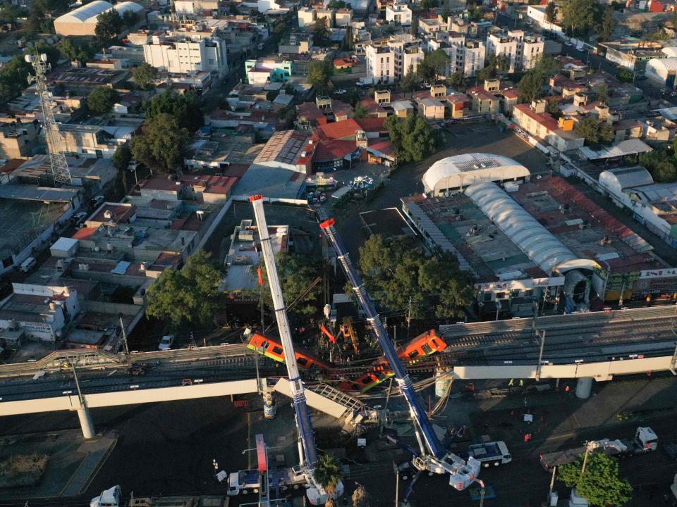 An aerial view shows the site of a metro train accident after an overpass for a metro partially collapsed in Mexico City on May 4, 2021.AFP via Getty Images