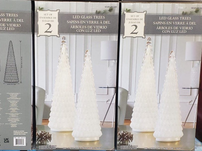 Light-colored boxes of glass christmas trees at Costco