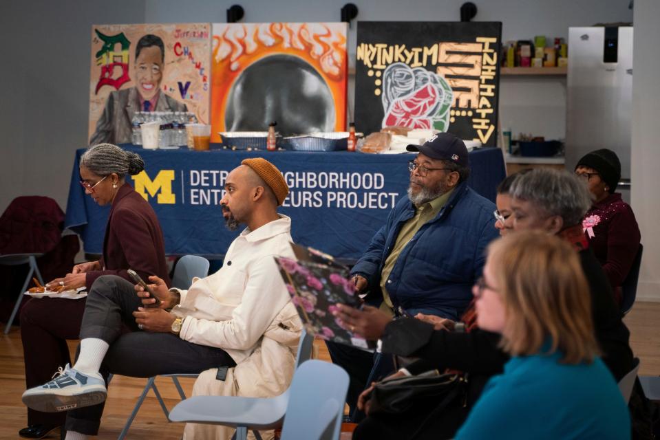 Community members and business owners listen during a presentation about search engine optimization (SEO) during a small business resource fair hosted by Jefferson East Inc. at the Neighborhood Resource Hub in Detroit on March 20, 2023.