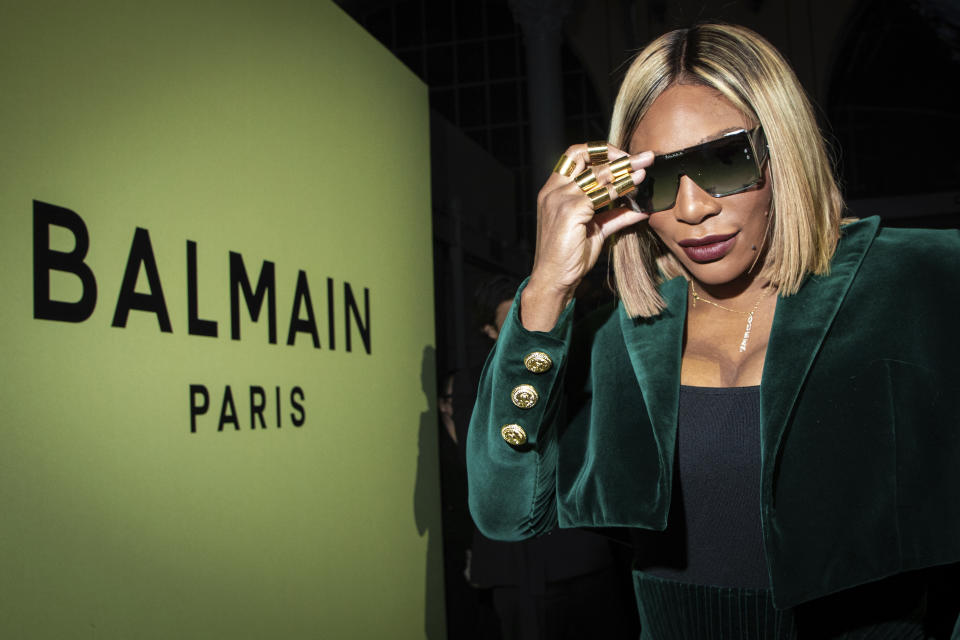 FILE - Serena Williams attends the Balmain Ready To Wear Fall/Winter 2022-2023 fashion collection, unveiled during the Fashion Week in Paris, Wednesday, March 2, 2022. Serena Williams says she is ready to step away from tennis after winning 23 Grand Slam titles, turning her focus to having another child and her business interests. “I’m turning 41 this month, and something’s got to give,” Williams wrote in an essay released Tuesday, Aug. 9, 2022, by Vogue magazine. (Photo by Vianney Le Caer/Invision/AP, FIle)