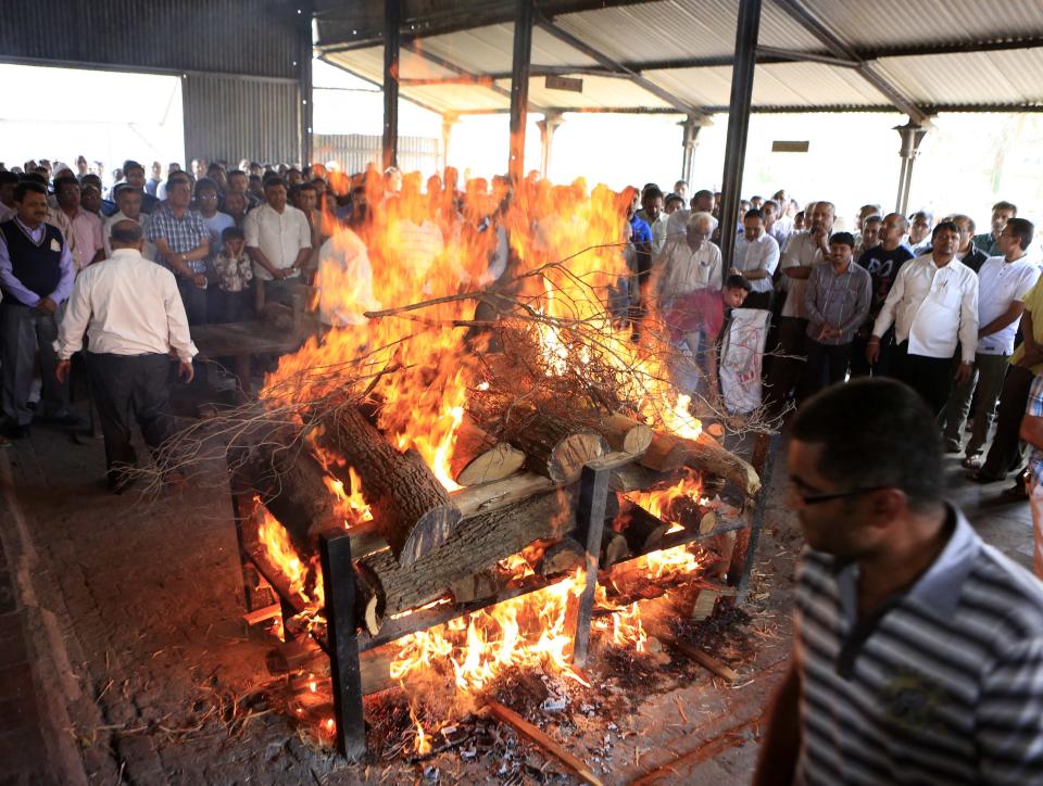 The body of a victim killed at a shopping mall shooting spree is cremated in Nairobi