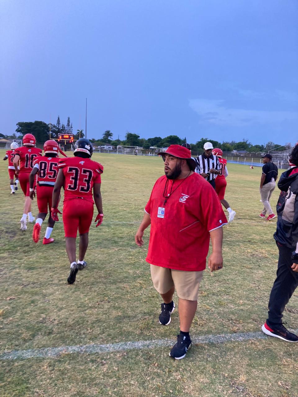Santaluces head coach Hector Clavijo prepares his team to play against South Broward in spring football competition on Thursday in Lantana.