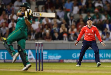 Britain Cricket - England v Pakistan - NatWest International T20 - Emirates Old Trafford - 7/9/16 Pakistan's Khalid Latif in action as England's Eoin Morgan looks on Action Images via Reuters / Lee Smith Livepic