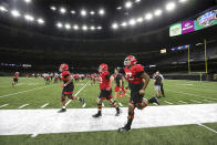 Georgia players take the field during team practice for the Sugar Bowl NCAA college football game against Baylor, Sunday, Dec. 29, 2019, in New Orleans. The game is to be played Wednesday, Jan. 1, 2020. (Curtis Compton/Atlanta Journal-Constitution via AP)