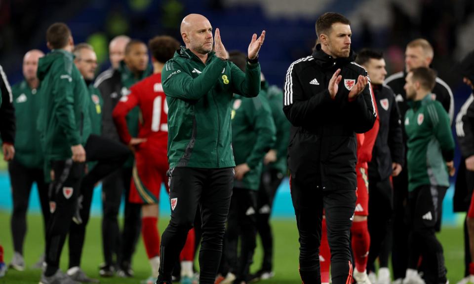 <span>Rob Page applauds <a class="link " href="https://sports.yahoo.com/soccer/teams/wales/" data-i13n="sec:content-canvas;subsec:anchor_text;elm:context_link" data-ylk="slk:Wales;sec:content-canvas;subsec:anchor_text;elm:context_link;itc:0">Wales</a> fans after his side’s playoff defeat against Poland.</span><span>Photograph: Richard Heathcote/Getty Images</span>