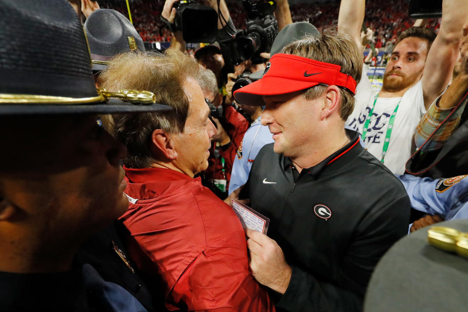 ATLANTA, GA - DECEMBER 01:  Head coach Nick Saban of the Alabama Crimson Tide shakes hands with head coach Kirby Smart of the Georgia Bulldogs after the Alabama Crimson Tide defeated the Georgia Bulldogs 35-28 in the 2018 SEC Championship Game at Mercedes-Benz Stadium on December 1, 2018 in Atlanta, Georgia.  (Photo by Kevin C. Cox/Getty Images)
