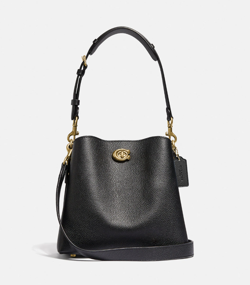 Willow Bucket Bag in black leather with gold buckle (Photo via Coach)