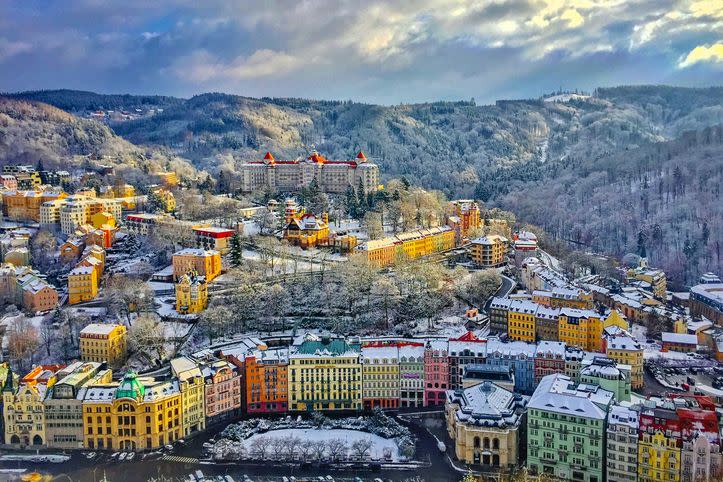 <p>While the Eastern European city of Zubrowka is fictional, production designer Adam Stockhausen and director Wes Anderson spent time across the Czech Republic pulling inspiration from various multicolored towns including the famous spa town of Karlovy Vary. In this Czech city, you'll find a strikingly similar hotel, The Hotel Imperial, sitting atop a mountain overlooking the city.</p>